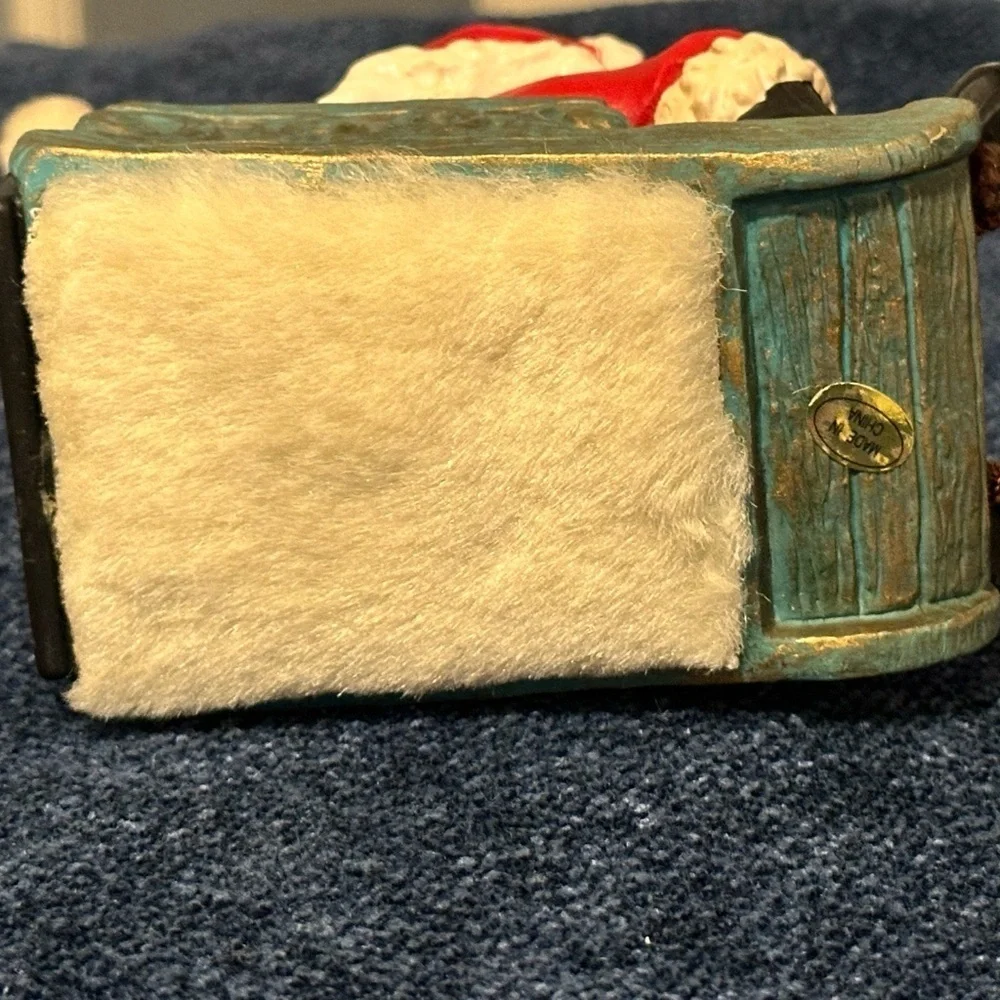 Musical vibrating Santa on his sleigh. Plays 3 songs!